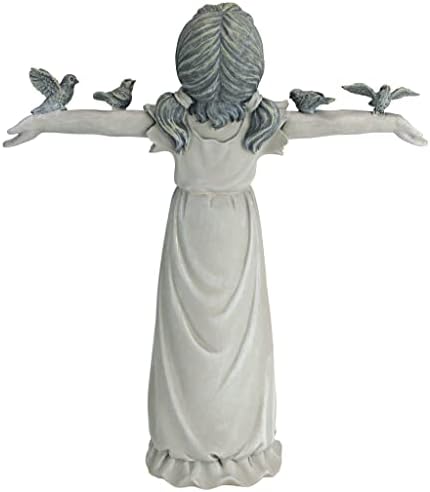 Dziewczynka z ptakami w kamieniu